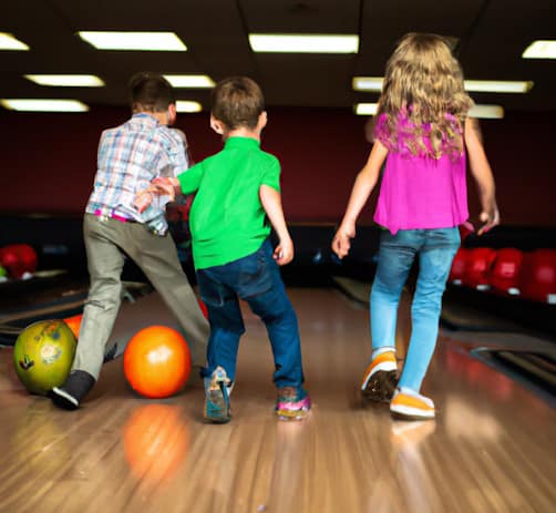 Kids having fun bowling with bowl-a-thon fundraisers