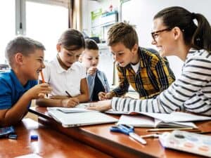 School Fundraising With Happy Children And Teacher