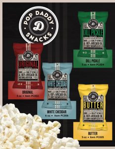 Showcasing four Pop Daddy Snacks popcorn flavors—Original, Dill Pickle, White Cheddar, Butter—with popcorn and brand logo; perfect for your next fundraising catalog!.