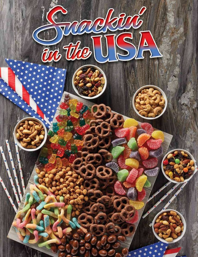 Delicious snacks—gummy candies, chocolate pretzels, nuts—plus USA-themed napkins and straws for a patriotic fundraising event.